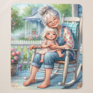 Oma und Enkelin umarmen sich auf der Veranda Sherpadecke