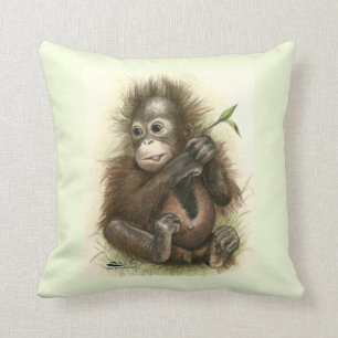 Orang-Utan Baby mit Blätter Kissen