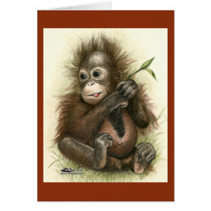 Orang-Utan-Baby mit Blättern