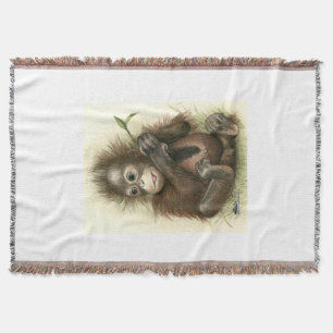 Orang-Utan-Baby mit Blättern Decke