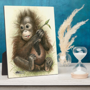 Orang-Utan-Baby mit Blättern Fotoplatte