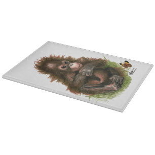 Orang-Utan-Baby und Schmetterling Schneidebrett