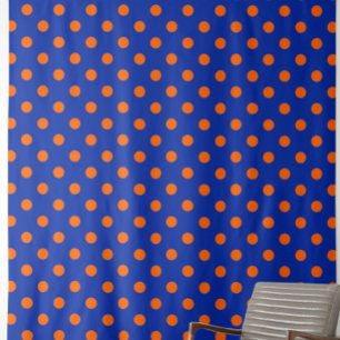 Orange auf blauem Punkte-Musterdesign Stoff
