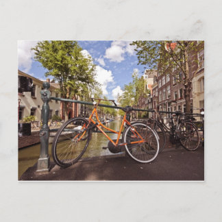 Orange bike in Amsterdam Niederlande Postkarte