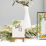 Orange Blossom Citrus Frucht Hochzeit Tischnummer<br><div class="desc">Orangefarbene Hochzeitsblüte mit Orangen, Orangenblüte, Grünpflanzen und Hängeband auf einem neutralen Hintergrund. Frisch, zesty, natürliches Design, um eine Frühlings- oder Sommerhochzeit mit einem Orangenfruchthochzeitthema zu ergänzen. Für die Koordinierung von Einladungen, Schreibwaren, Tag der Veranstaltung und Tischdekoration, Spielen und Hochzeitsschildern, schauen Sie bitte in meiner Orange Blossom Wedding Collection nach oder...</div>