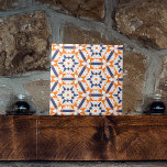 Orange Blue Cream Geometric Hexagons Muster Fliese<br><div class="desc">Diese Keramik-Kachel weist ein faszinierendes geometrisches Muster auf, das aus sternförmigen Motiven besteht, umgeben von einer Reihe von Dreiecken und anderen Polygonen, wodurch ein kaleidoskopischer Effekt entsteht. Die Farbpalette ist eine auffallende Kombination aus sanften Orangen, tiefblauem Marineblau und weißen Farbtönen, die zusammen einen auffälligen Kontrast schaffen. Jedes Element innerhalb des...</div>
