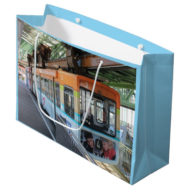 Orange Blue Wuppertal Floating Train Große Geschenktüte (Vorderseite Schrägansicht)