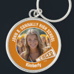 Orange Cheerleader Foto High School Spirit Schlüsselanhänger<br><div class="desc">Dieses coole,  kundenspezifische Highschool Cheerleader Foto Geschenk zeigt eine weiße Typografie Ihres Teams und Spielernamen auf einem orangefarbenen Schlüsselanhänger mit einem fröhlichen Megaphon. Personalisieren Sie sich mit dem Foto Ihres Schülers und das Klassenzjahr als stolze,  aufregende Eltern. Ein tolles Geschenk für eine Mutter oder einen Vater.</div>