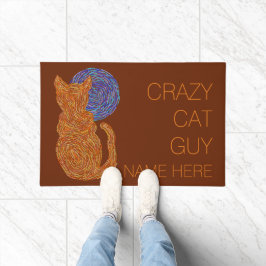 Orange Katze Z und das Fußmatte