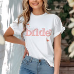 Orange PINK Disco Bridge Brautparty hen DO Shirt<br><div class="desc">Mit unserer Kollektion Retro Disco Ball Bridal Shower Invitations & Decor können Sie in die Vergangenheit zurückblicken. Tauchen Sie ein in die Nostalgie des 70ers mit gedämpften beigen und grauen Arkaden, die durch zauberhafte Schriftart aus silberfarbenem Glitzer ergänzt werden. Die typische Retro-Disco-Bühne erinnert an eine Zeit des Disco-Glamours und bewahrt...</div>
