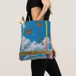 Orange Schmetterlinge im traumhaft blauen Himmel Tasche