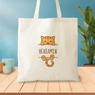 Orange Tabby Cat Peeking hinter Individuelle Name Tragetasche