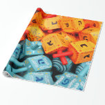 Orange und Blue Dreidels Geschenkpapier<br><div class="desc">Foto von farbenfrohen orangen und blauen dreiköpfigen. Bild von Adiel lo, wikicommons.</div>
