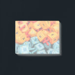 Orange und Blue Dreidels Post-it Klebezettel<br><div class="desc">Foto von farbenfrohen orangen und blauen dreiköpfigen. Bild von Adiel lo,  wikicommons.</div>