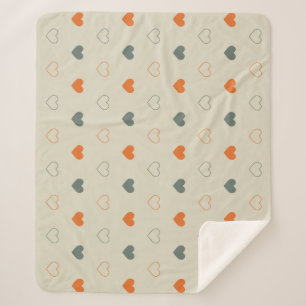 Orange- und Grün-Herz-Rastermuster Sherpadecke
