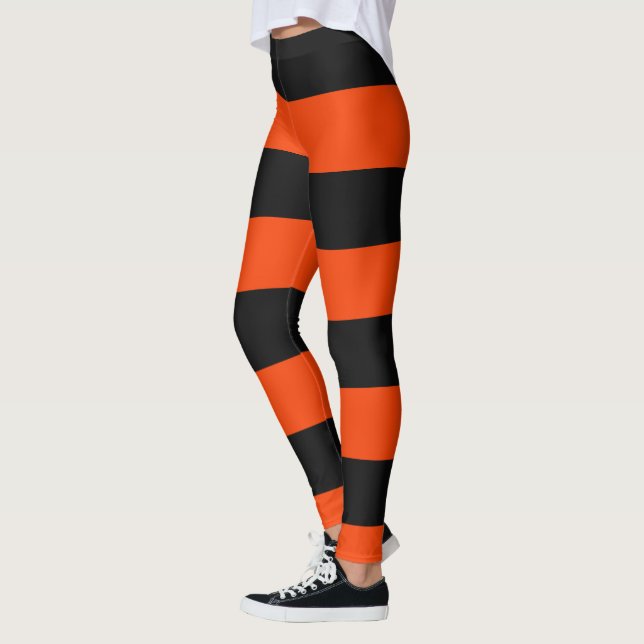 Orange- und Schwarz-Weiß-Streifen Leggings (Links)