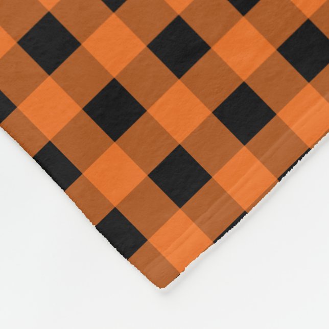 Orange und schwarzer Gingham überprüftes Muster Fleecedecke (Ecke)
