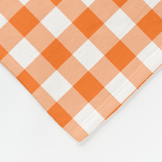 Orange und weißer Gingham überprüftes Muster Fleecedecke (Ecke)