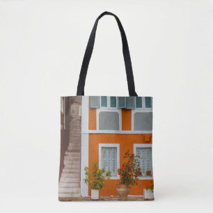ORANGE WEISS UND GRAUES BETONGEBÄUDE TASCHE