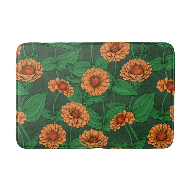 Orange Zinnia Blume, grüne Blätter auf dunkelgrün Badematte (Vorderseite)