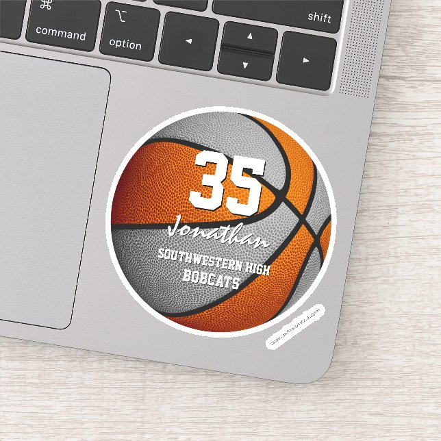 Orangefarbene Basketballmannschaft färbt Spirituos Aufkleber (Detail)