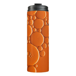 Orangefarbene Blasen Thermosbecher