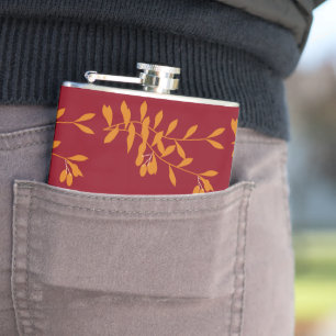 Orangefarbene Blätter der Silhouette auf rot Flachmann