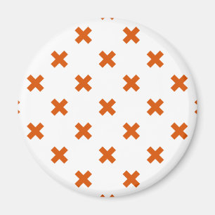 Orangefarbene Kreuzstiche auf weiß Magnet