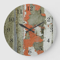 Orangefarbene Kronenfarbe auf der Betonwand
