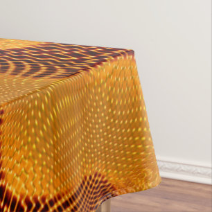 Orangefarbene Kurve und goldene Punkte auf braunem Tischdecke