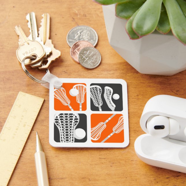 Orangefarbene Lacrosse Blöcke Schlüsselanhänger (Schreibtisch)