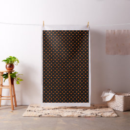 Orangefarbene Polka-Kreuze auf schwarz Stoff