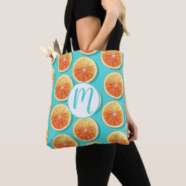 Orangefarbene Scheiben auf blau Tasche