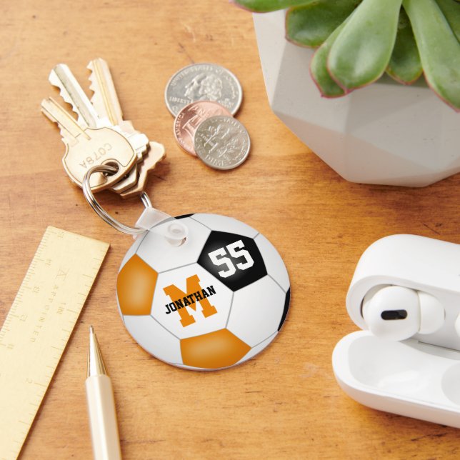 Orangefarbene schwarze Mannschaft Farben Jungs Mäd Schlüsselanhänger (Schreibtisch)