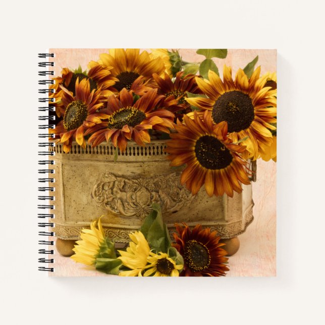Orangefarbene Sonnenblumen im Körbchen Notizbuch (Vorderseite)