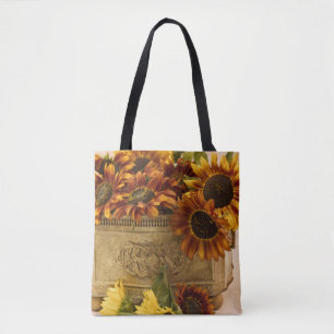 Orangefarbene Sonnenblumen im Körbchen Tasche