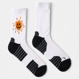 Orangefarbene Stelle mit Kürbisgesicht Socken