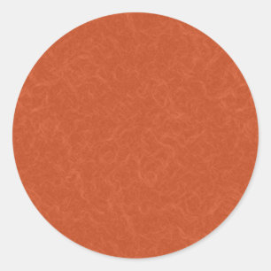 Orangefarbene texturierte Oberfläche mit wirbelnde Runder Aufkleber