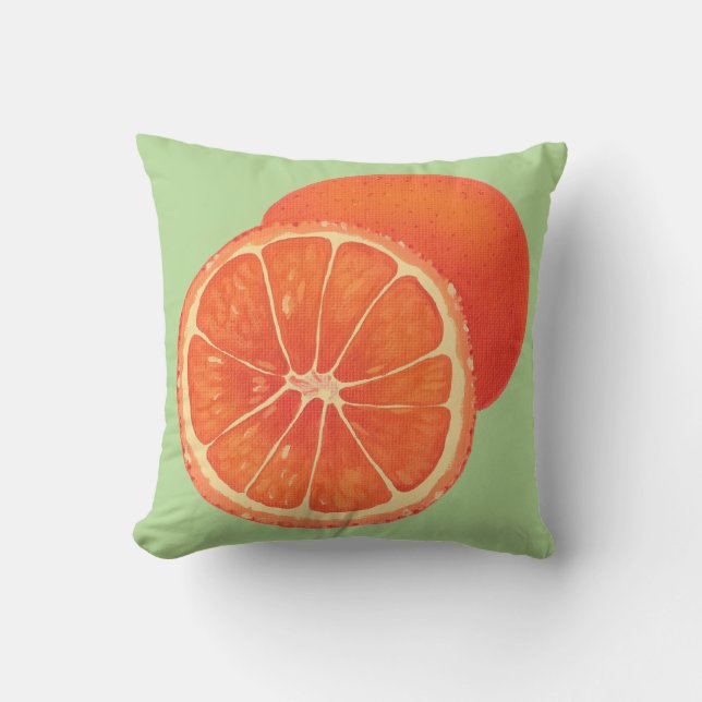 Orangefarbene und geschnittene Orangen auf grünen  Kissen (Vorderseite)