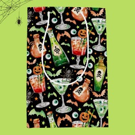 Orangefarbene und grüne Halloween-Cocktails und -T Mittlere Geschenktüte