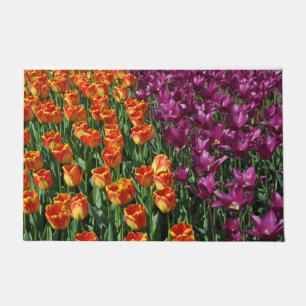 Orangefarbene und lila Tulpen Schönheit Fußmatte