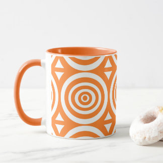 Orangefarbene und weiße Tasse mit Abstraktem Muste