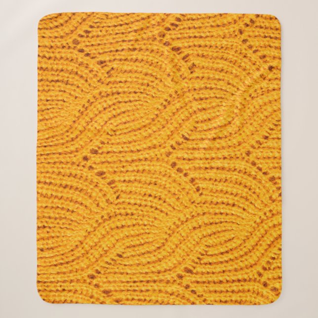 Orangefarbener Pullover, texturierter Hintergrund. Sherpadecke (Vorderseite)