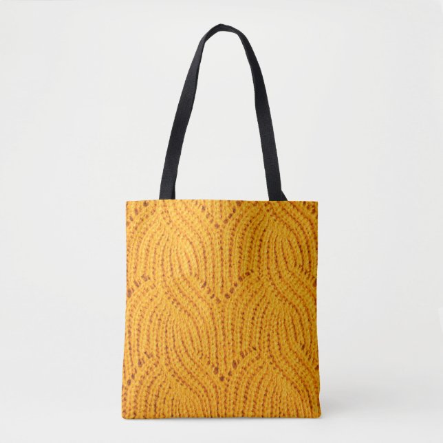 Orangefarbener Pullover, texturierter Hintergrund. Tasche (Vorderseite)