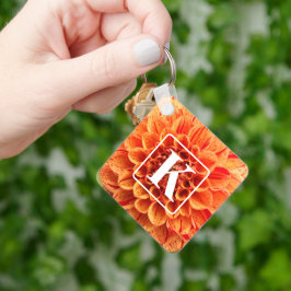 Orangefarbener Schlüsselanhänger der Blume mit Mon