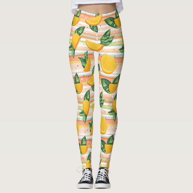 Orangefarbenes Muster mit grünen Blätter auf Paste Leggings (Vorderseite)