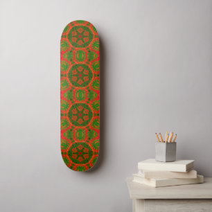 Orangefarbenes und grünes Kaleidoskop-Skateboard Skateboard