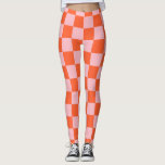 Orangefarbenes und rosafarbenes Prüfmuster Leggings<br><div class="desc">Orangefarbenes und rosafarbenes Karton-Muster in Rosa und Orange.</div>