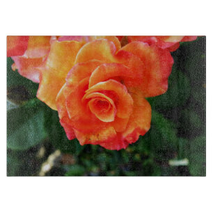 Orangene Rosenblüte Schneidebrett