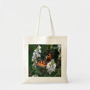 Orangene Schmetterlinge und weiße Blüten Tragetasche